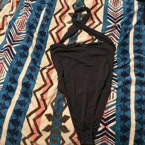Cheeky bodysuit, top part twist over your neck from the front black size 4, new
